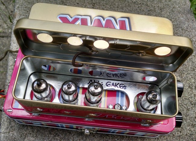 Photograph of the WR/6AK6s' four 6AK6 tubes in their TWix 'Heritage Tin' shield can.